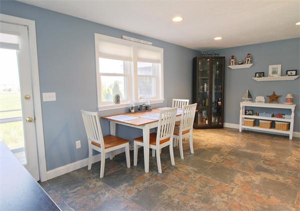 10 Cliff Estates Road, Unit 10 Scituate, MA 02066 - Photo 6 of 26 a dining room with furniture and window