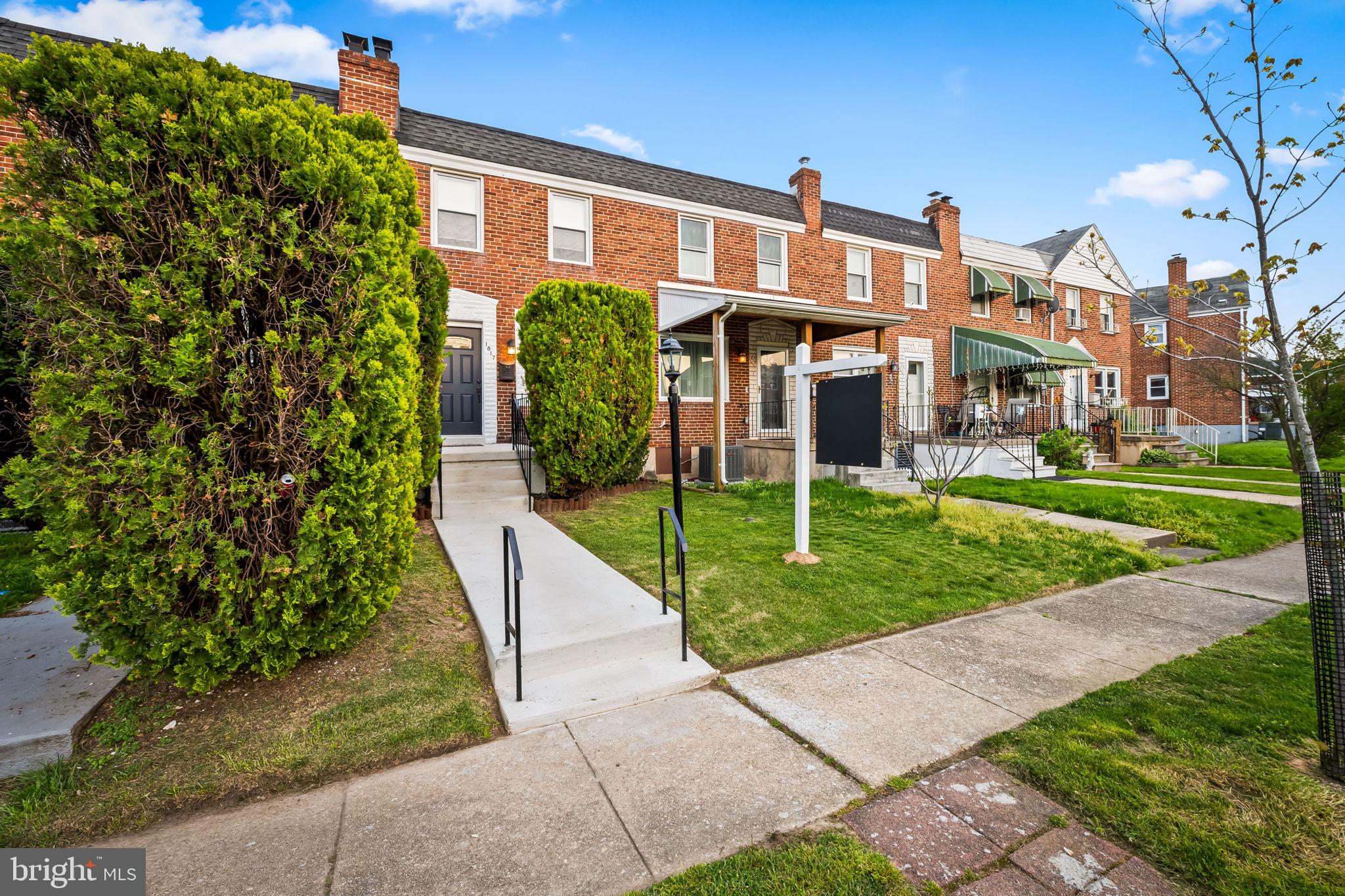 1817 Dunmere Road Baltimore, MD 21222 - Photo 2 of 27 a front view of a building with garden