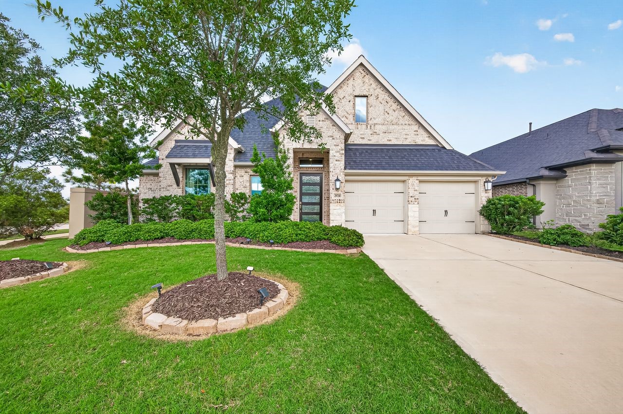 Beautiful Perry built 4 bedroom 1 story on CORNER LOT with upgraded front elevation featuring cathedral roof design