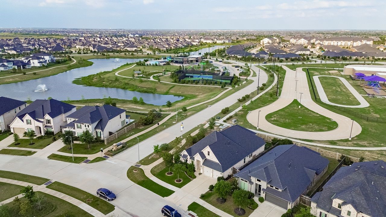 29730 Smoky Ridge Road Fulshear, TX 77441 - Photo 2 of 29 Amazing community and steps away from "The Landing" featuring a gym, pool, playground, tennis and amazing lake with walking trails