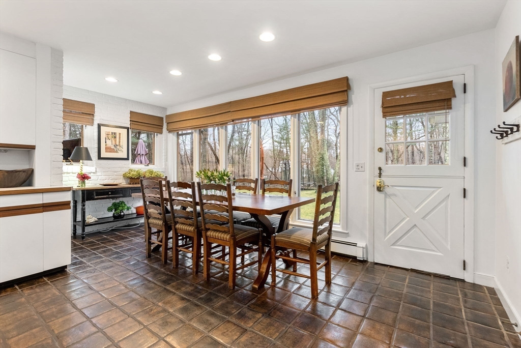 21 Gail Road Weston, MA 02493 - Photo 13 of 37 a view of a dining room with furniture window and outside view