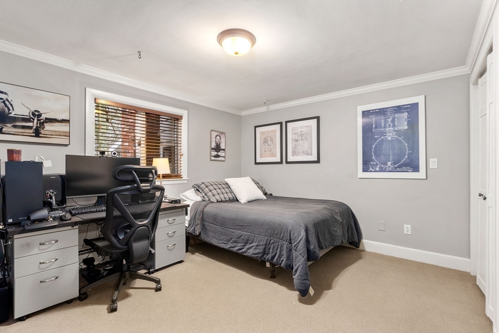 21 Gail Road Weston, MA 02493 - Photo 29 of 37 a bedroom with a workspace