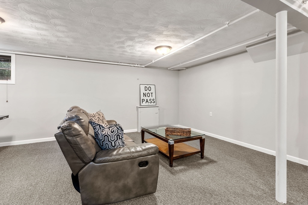 21 Gail Road Weston, MA 02493 - Photo 34 of 37 a living room with furniture