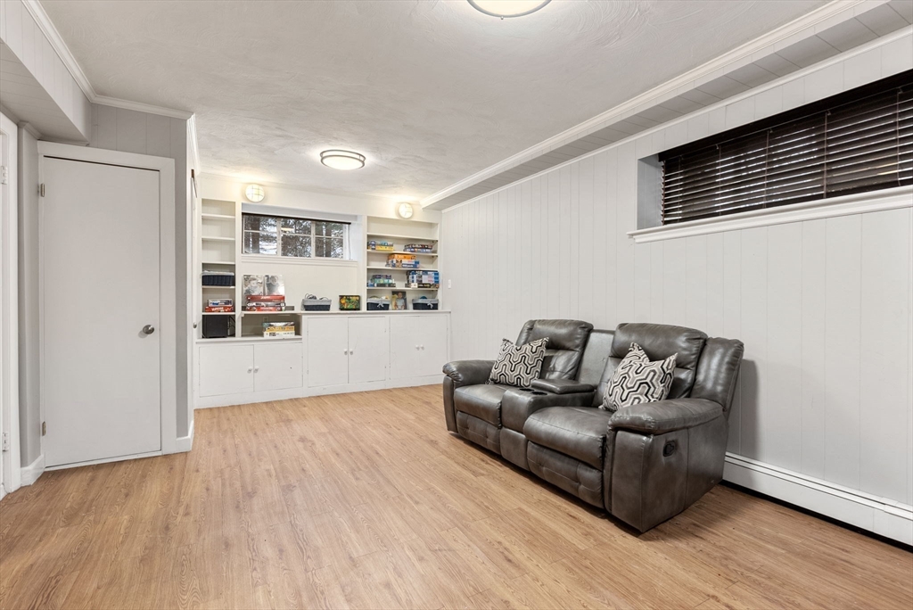 21 Gail Road Weston, MA 02493 - Photo 35 of 37 a living room with furniture and view of kitchen