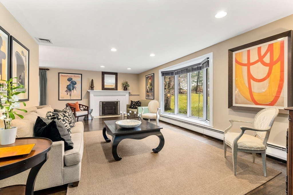21 Gail Road Weston, MA 02493 - Photo 6 of 37 a living room with furniture and a fireplace