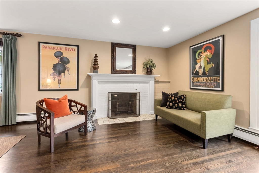 21 Gail Road Weston, MA 02493 - Photo 7 of 37 a living room with furniture and a fireplace