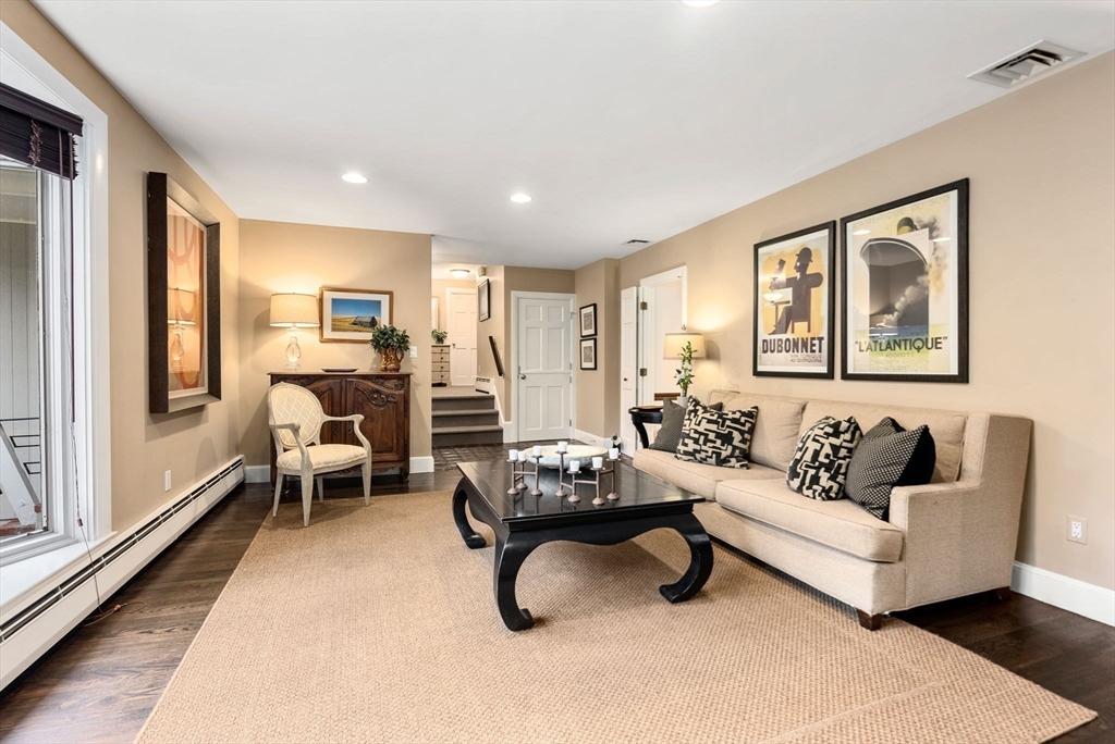 21 Gail Road Weston, MA 02493 - Photo 8 of 37 a living room with furniture and a large window