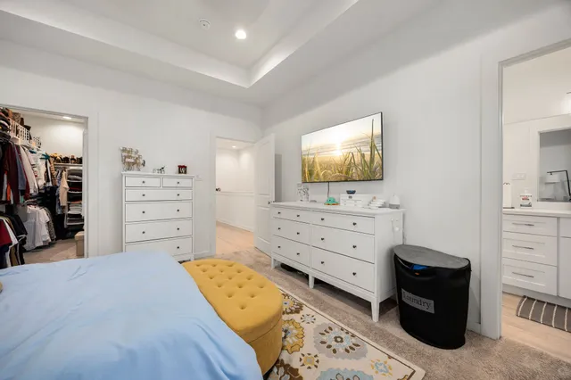 a room with furniture and flat screen tv