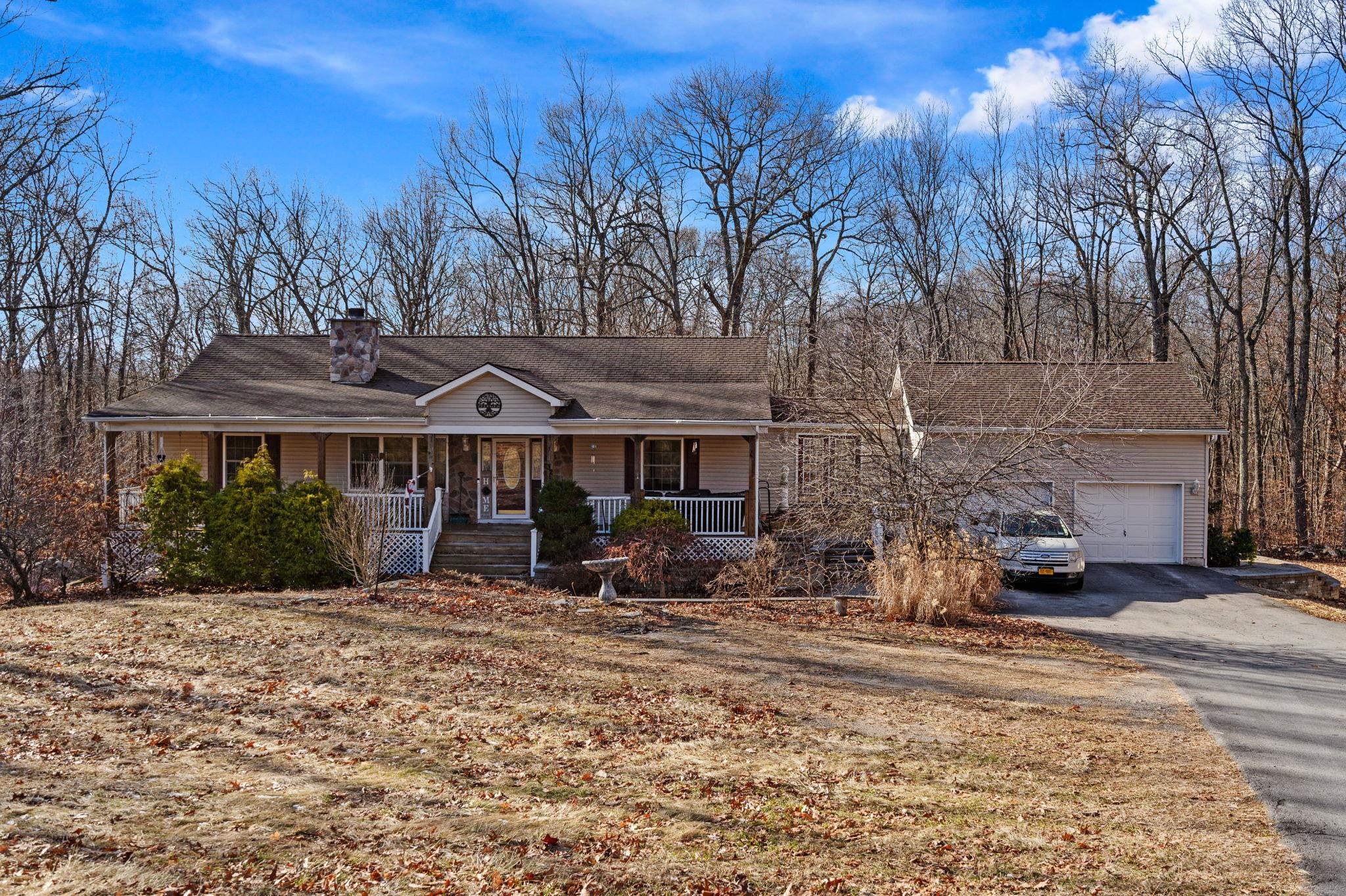 32 Pressler Road Wallkill, NY 12589 - Photo 1 of 1 Single story home with a garage, a chimney, covered porch, and driveway