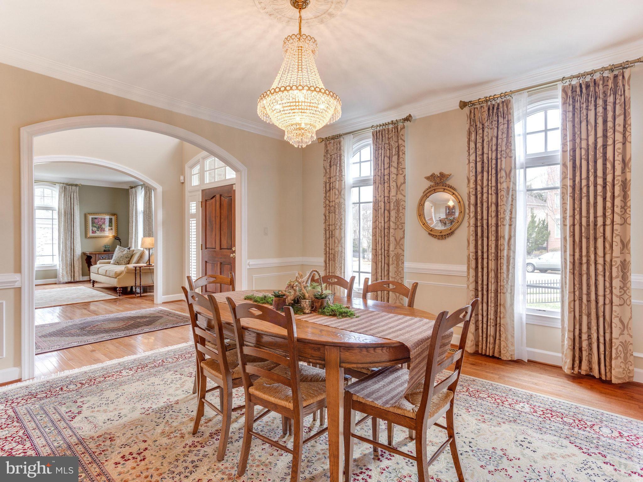 11107 Chessington Place Reston, VA 20194 - Photo 13 of 30 a view of a dining room with furniture and a large window
