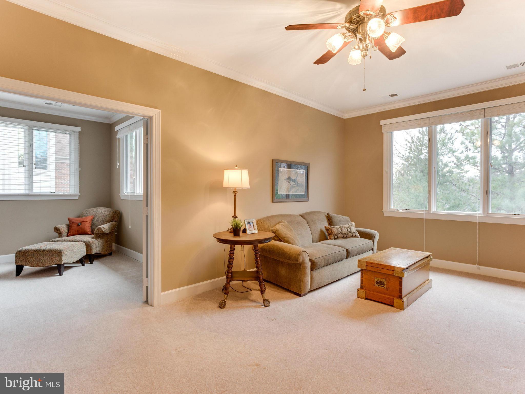 11107 Chessington Place Reston, VA 20194 - Photo 18 of 30 a living room with furniture and a large window