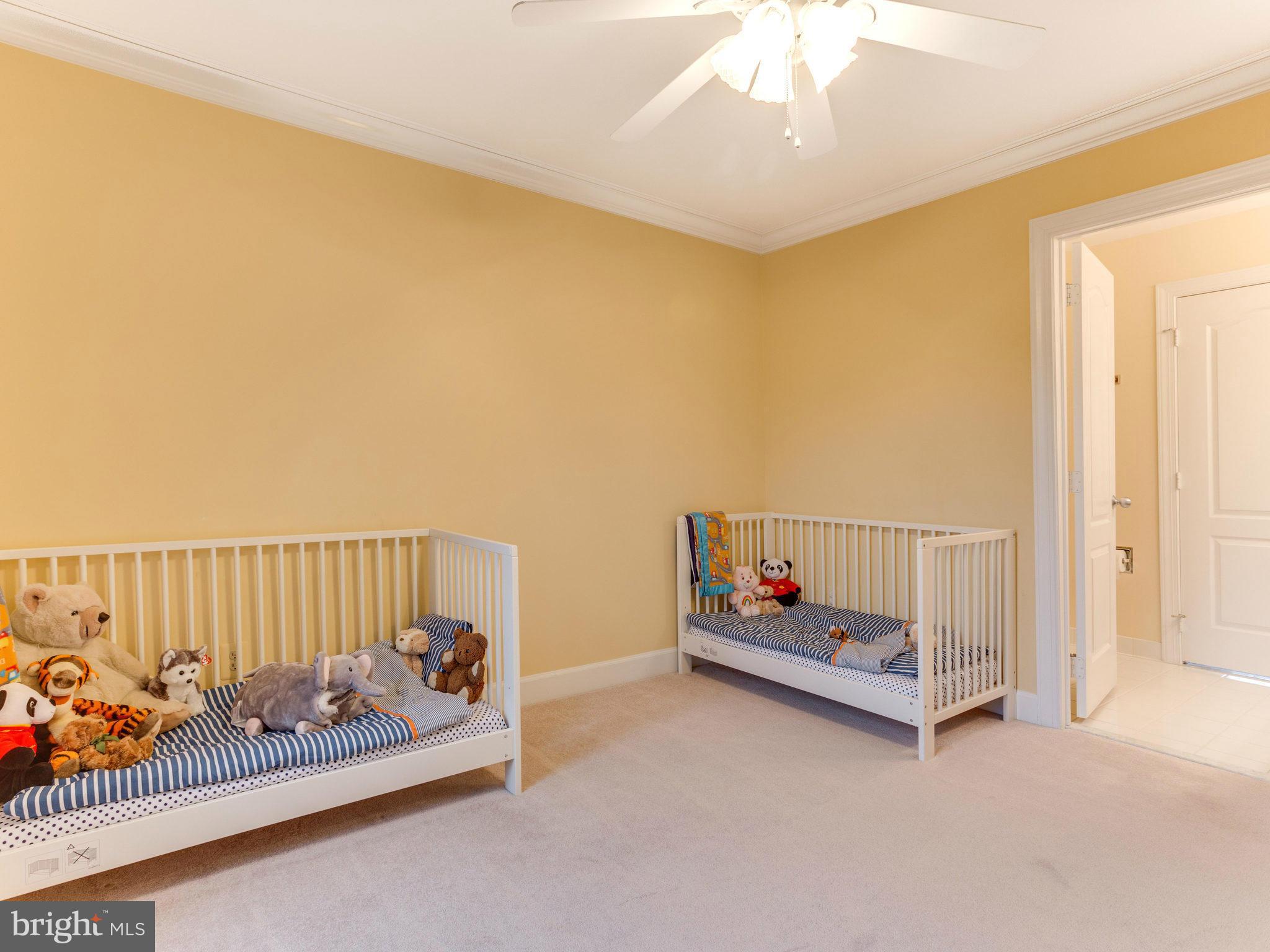 11107 Chessington Place Reston, VA 20194 - Photo 22 of 30 a bedroom with furniture