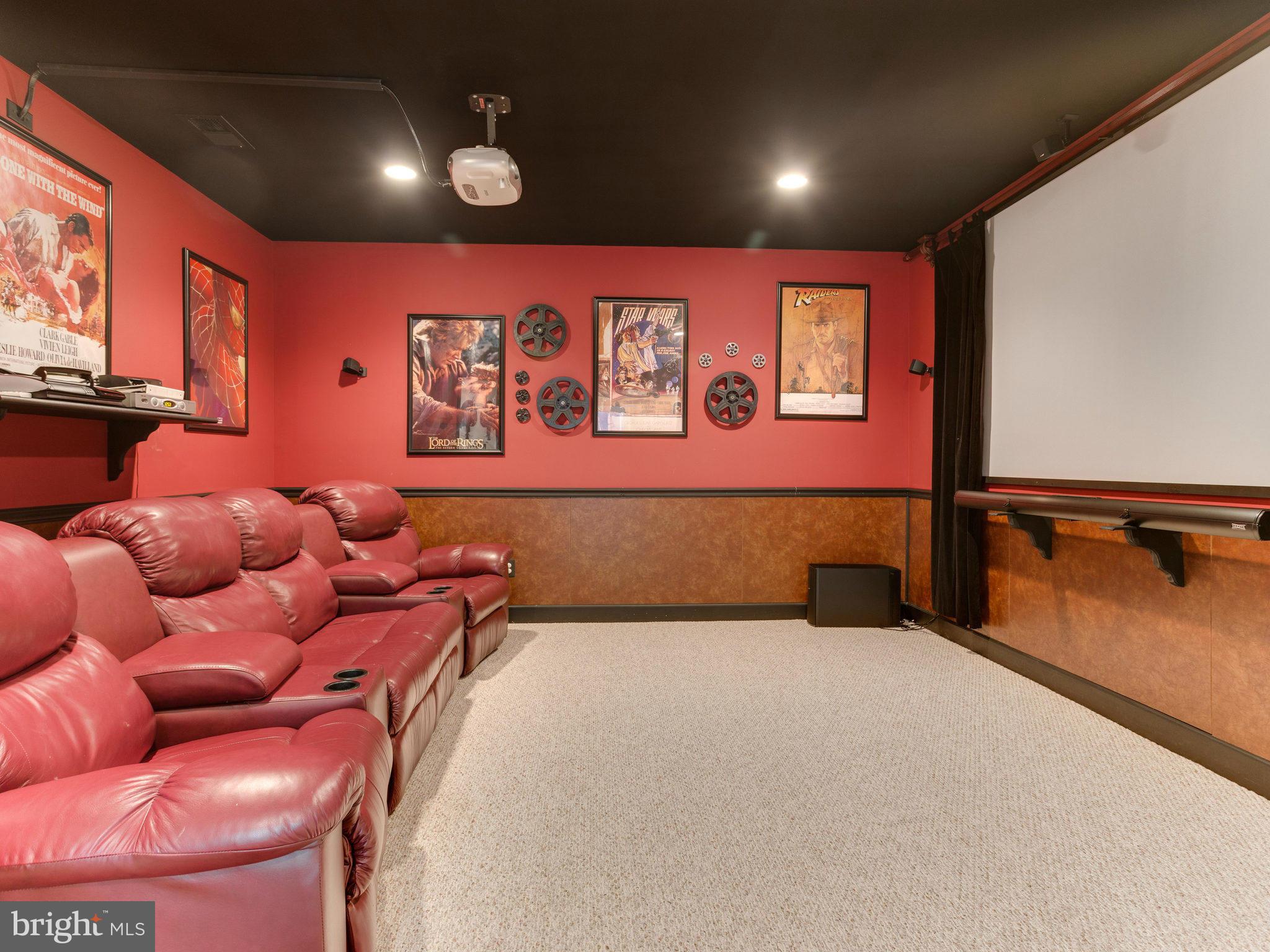 11107 Chessington Place Reston, VA 20194 - Photo 24 of 30 a bed room with a bed and paintings on the wall