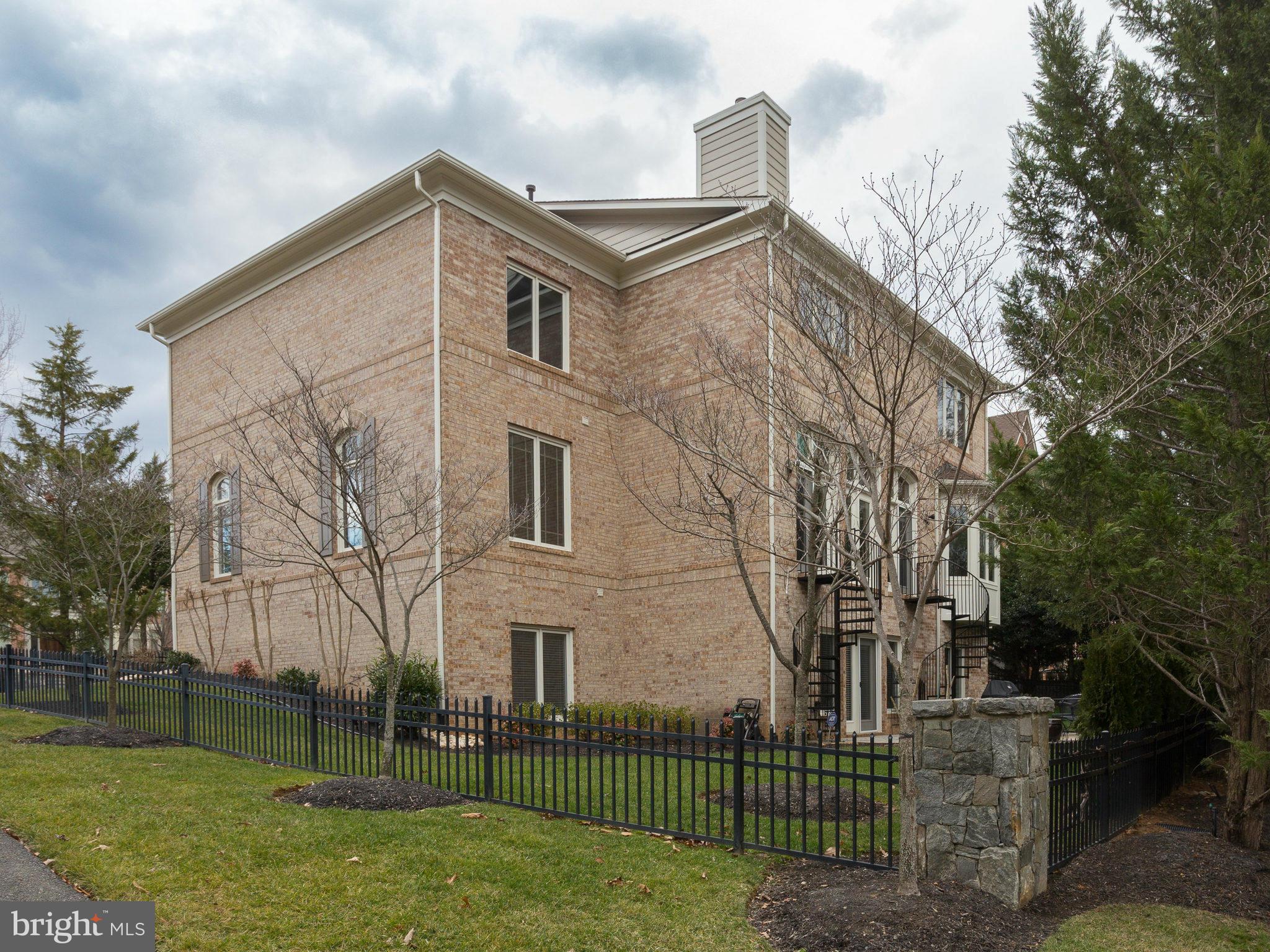 11107 Chessington Place Reston, VA 20194 - Photo 30 of 30 front view of a house with a yard