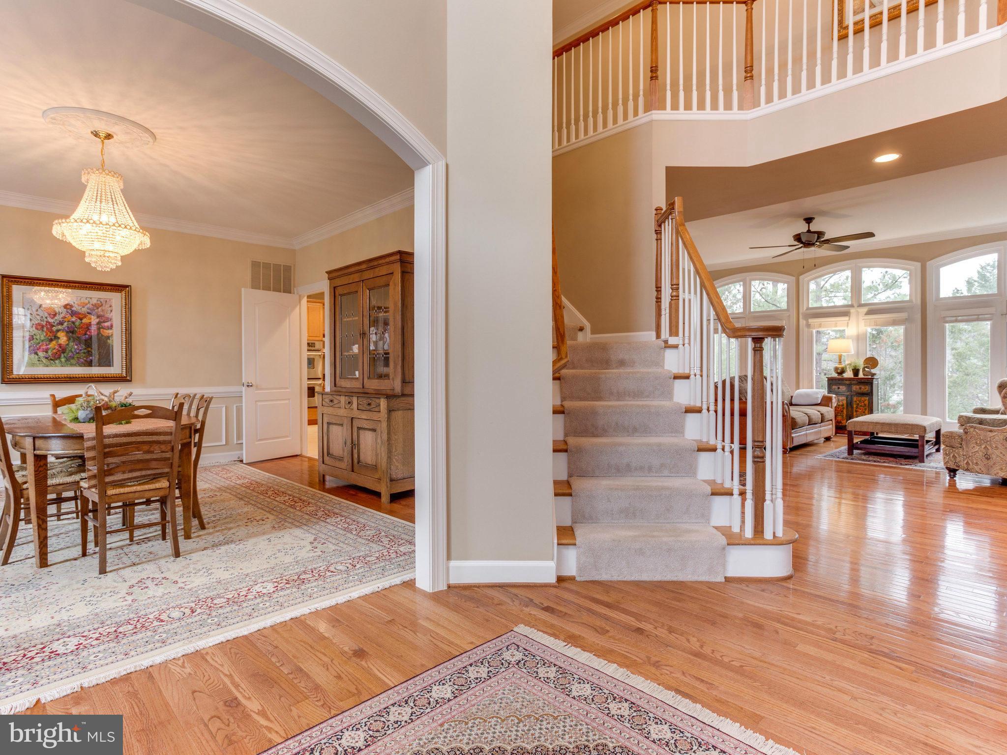 11107 Chessington Place Reston, VA 20194 - Photo 4 of 30 a view of a livingroom with furniture and front door