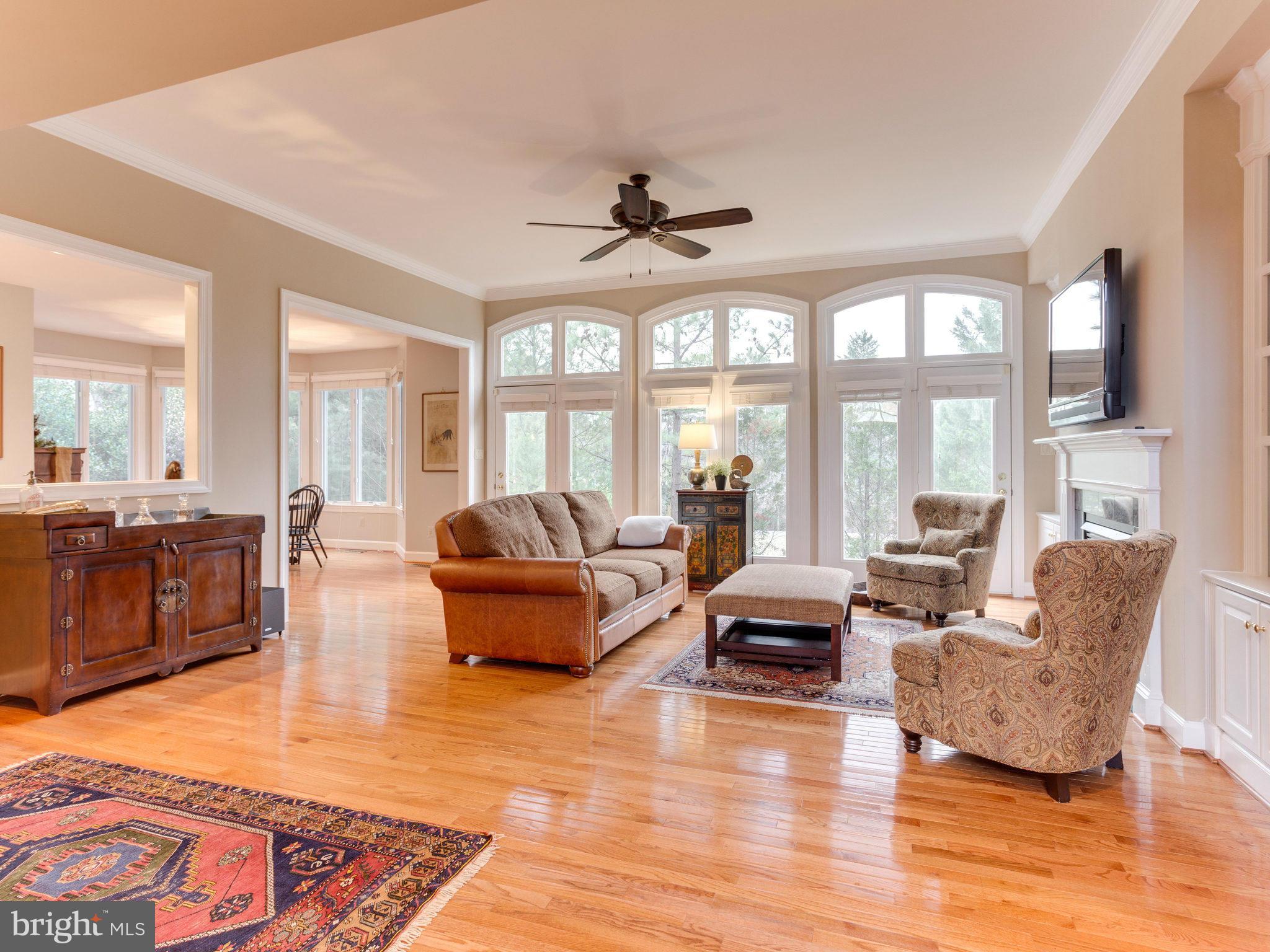 11107 Chessington Place Reston, VA 20194 - Photo 5 of 30 a living room with furniture and a large window