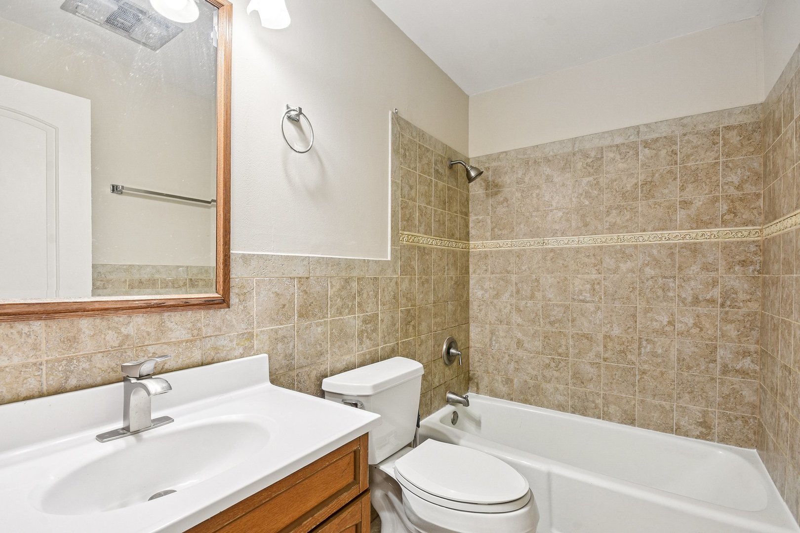 461 North Jonathan Drive, Unit 202 Palatine, IL 60074 - Photo 15 of 23 a bathroom with a sink a toilet and shower