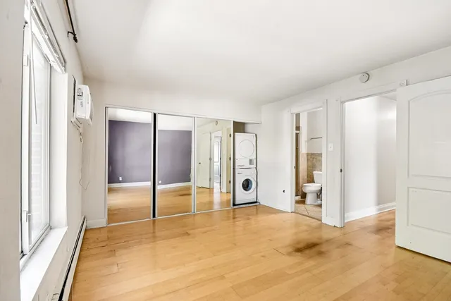 a view of empty room with painted walls