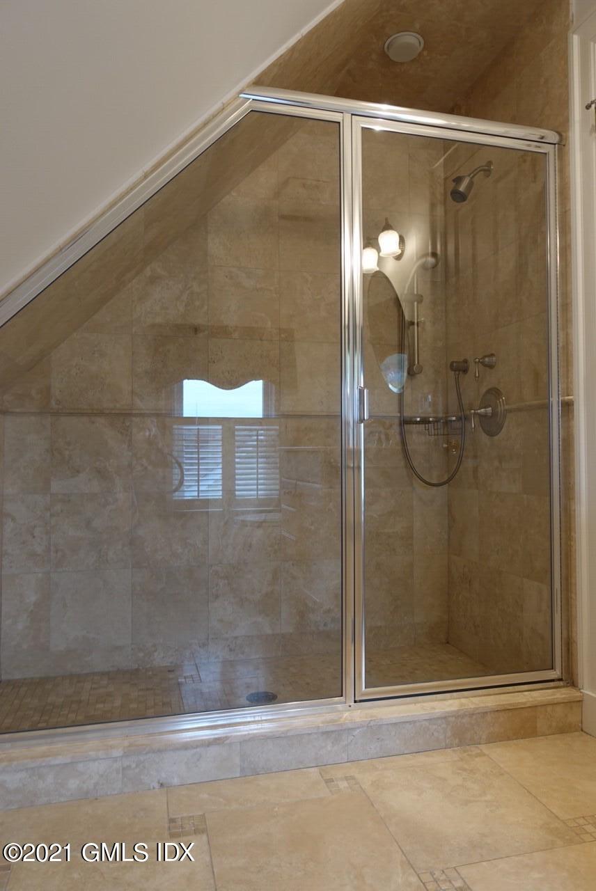 23 Benedict Place, Unit 3 Greenwich, CT 06830 - Photo 15 of 16 a bathroom with a shower