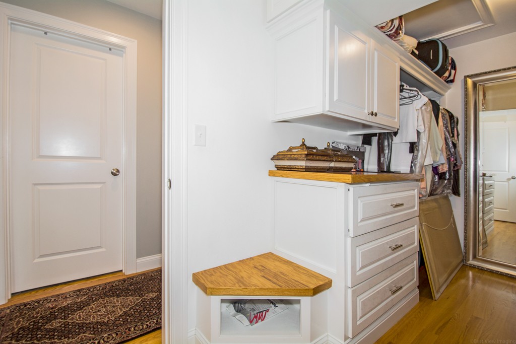 127 Lowell Street Lexington, MA 02420 - Photo 15 of 30 a kitchen with stainless steel appliances granite countertop a refrigerator and a stove