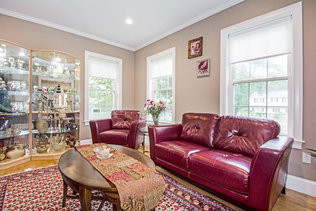 127 Lowell Street Lexington, MA 02420 - Photo 4 of 30 a living room with furniture and a window