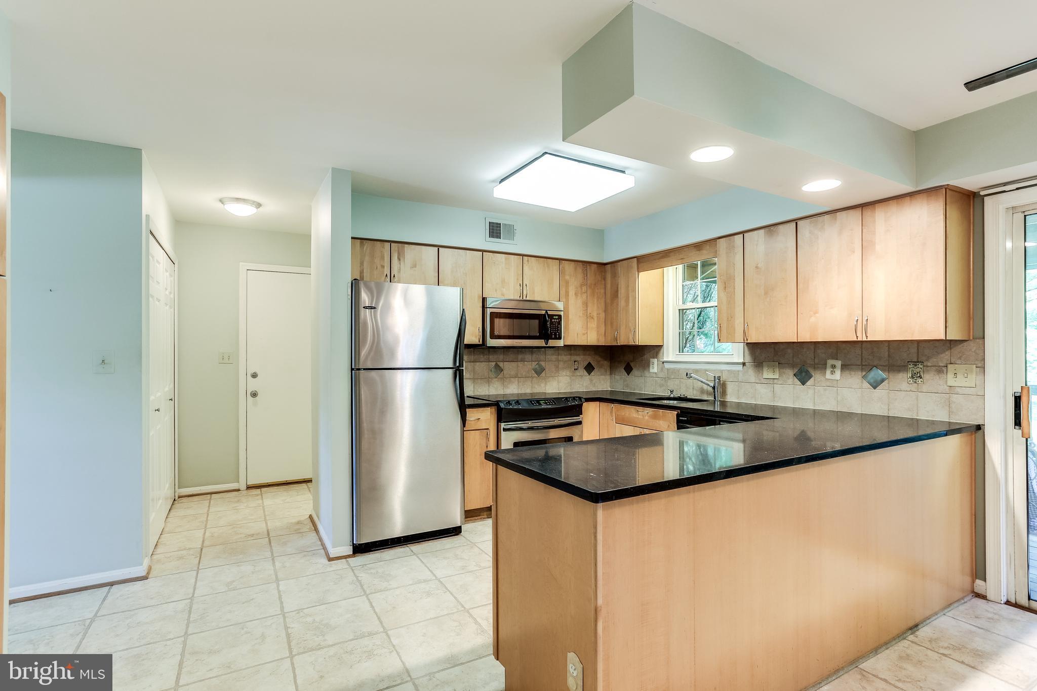 6905 Rawhide Ridge Columbia, MD 21046 - Photo 4 of 39 Updated Kitchen with custom cabinets