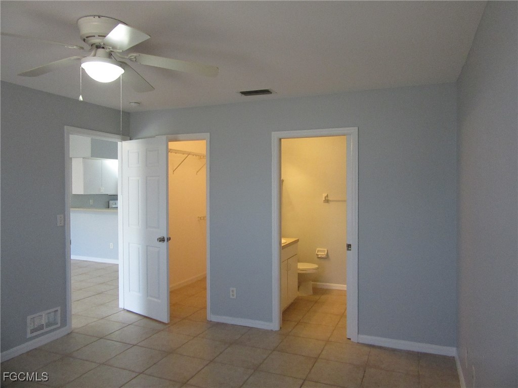 4544-4546 28th Street Southwest Lehigh Acres, FL 33973 - Photo 15 of 23 a view of a bathroom with a sink