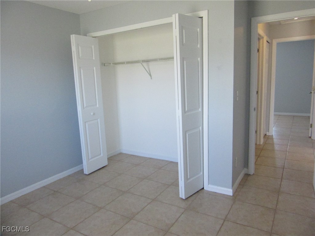 4544-4546 28th Street Southwest Lehigh Acres, FL 33973 - Photo 21 of 23 a view of an empty room