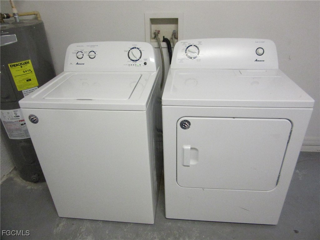 4544-4546 28th Street Southwest Lehigh Acres, FL 33973 - Photo 23 of 23 a utility room with dryer and washer