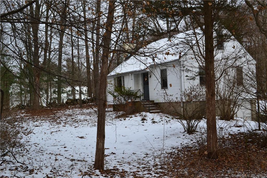 28 Great Hill Road Ridgefield, CT 06877 - Photo 1 of 1 a view of a house covered in snow