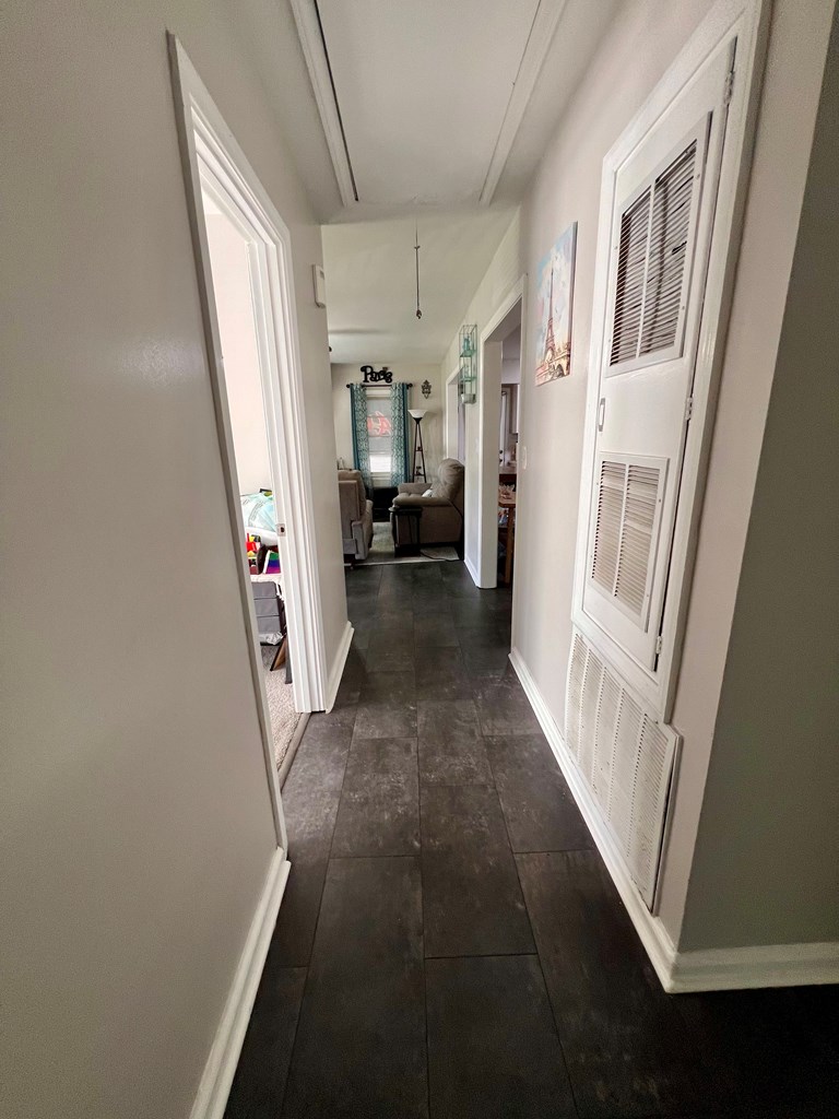263 Nightingale Drive Columbus, GA 31906 - Photo 8 of 19 a view of a hallway with furniture and a livingroom