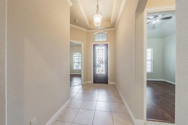 wooden floor in a gallery with a mirror
