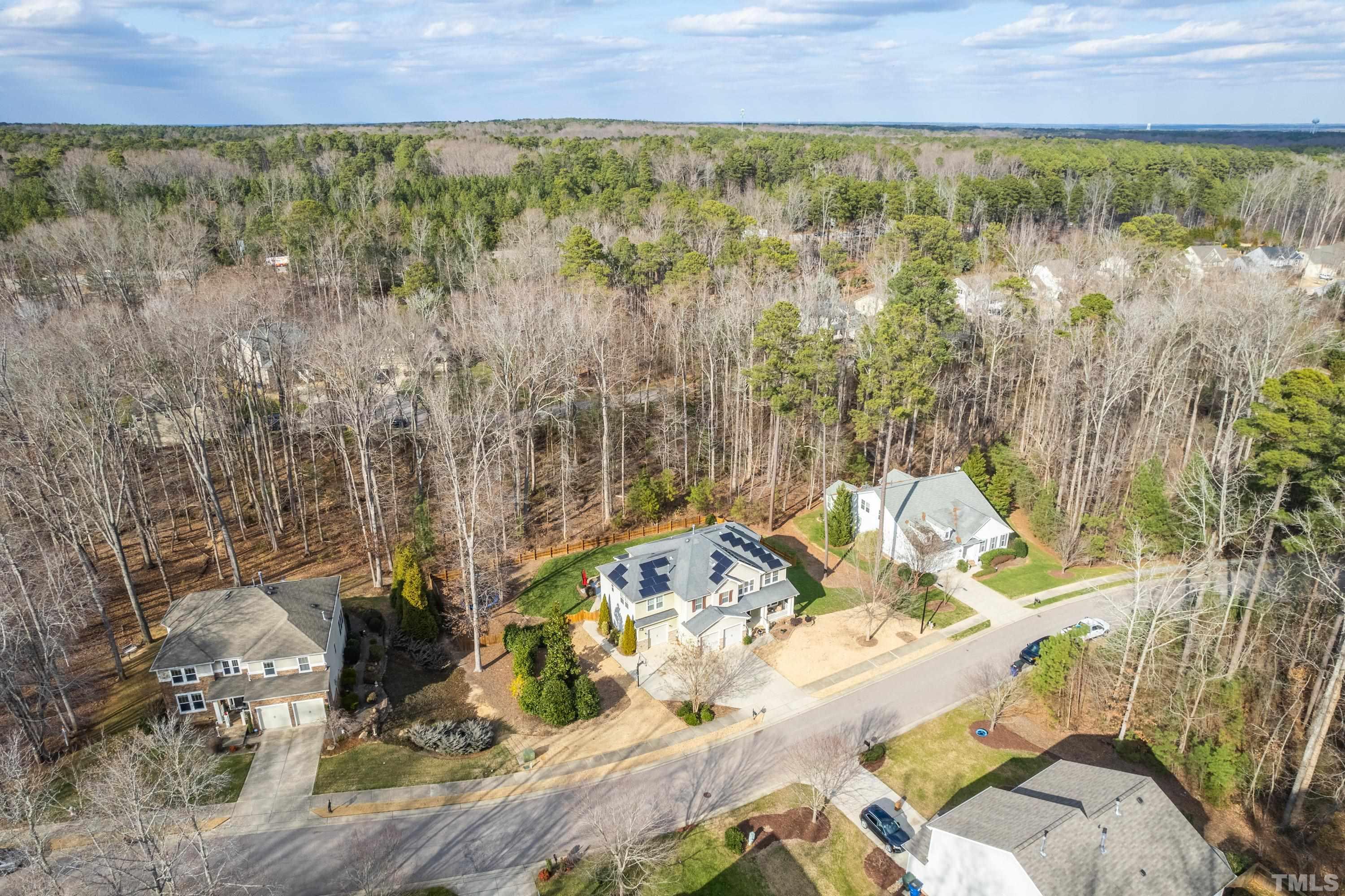 13016 Saxon Way Raleigh, NC 27613 - Photo 13 of 49 a view of a yard with table and chairs