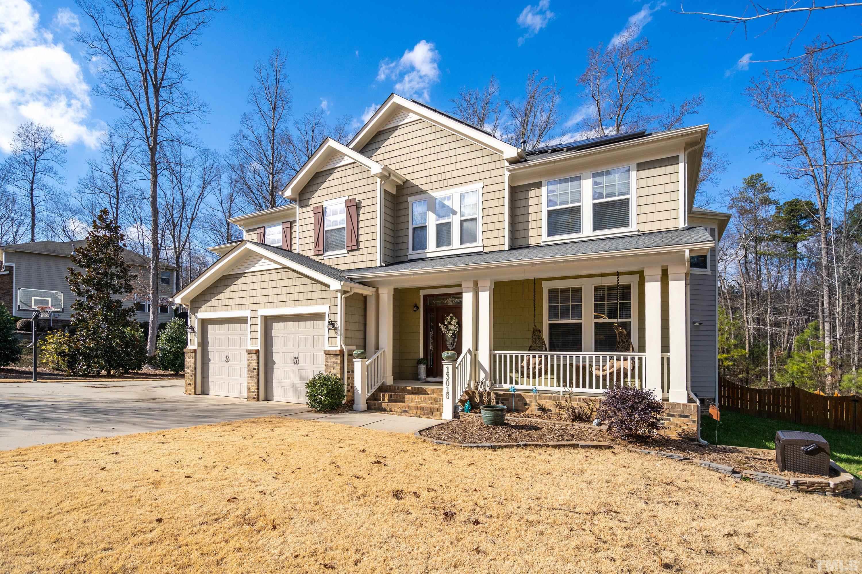 13016 Saxon Way Raleigh, NC 27613 - Photo 18 of 49 a view of a house with snow on the roadside