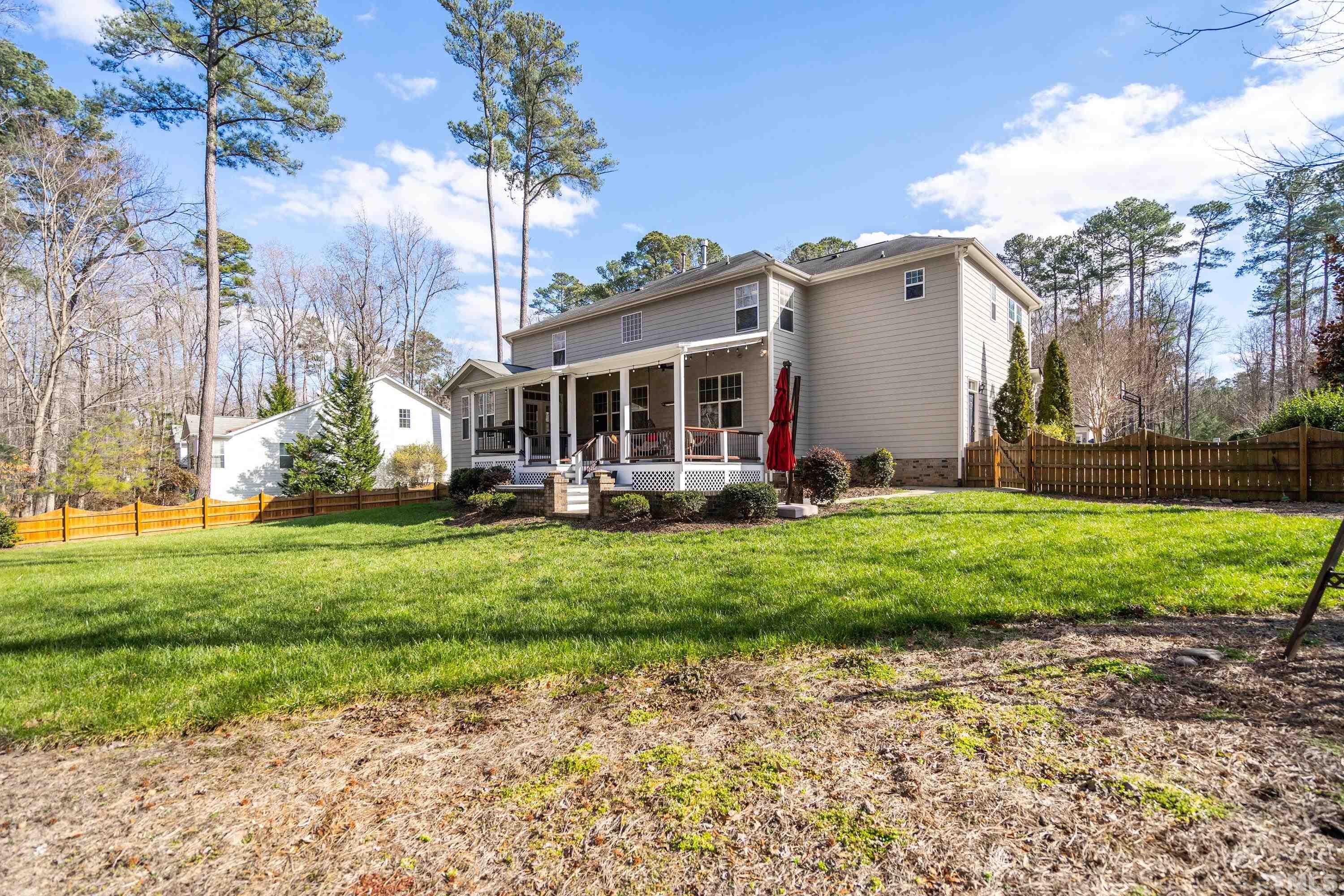 13016 Saxon Way Raleigh, NC 27613 - Photo 24 of 49 a view of a house with backyard and garden