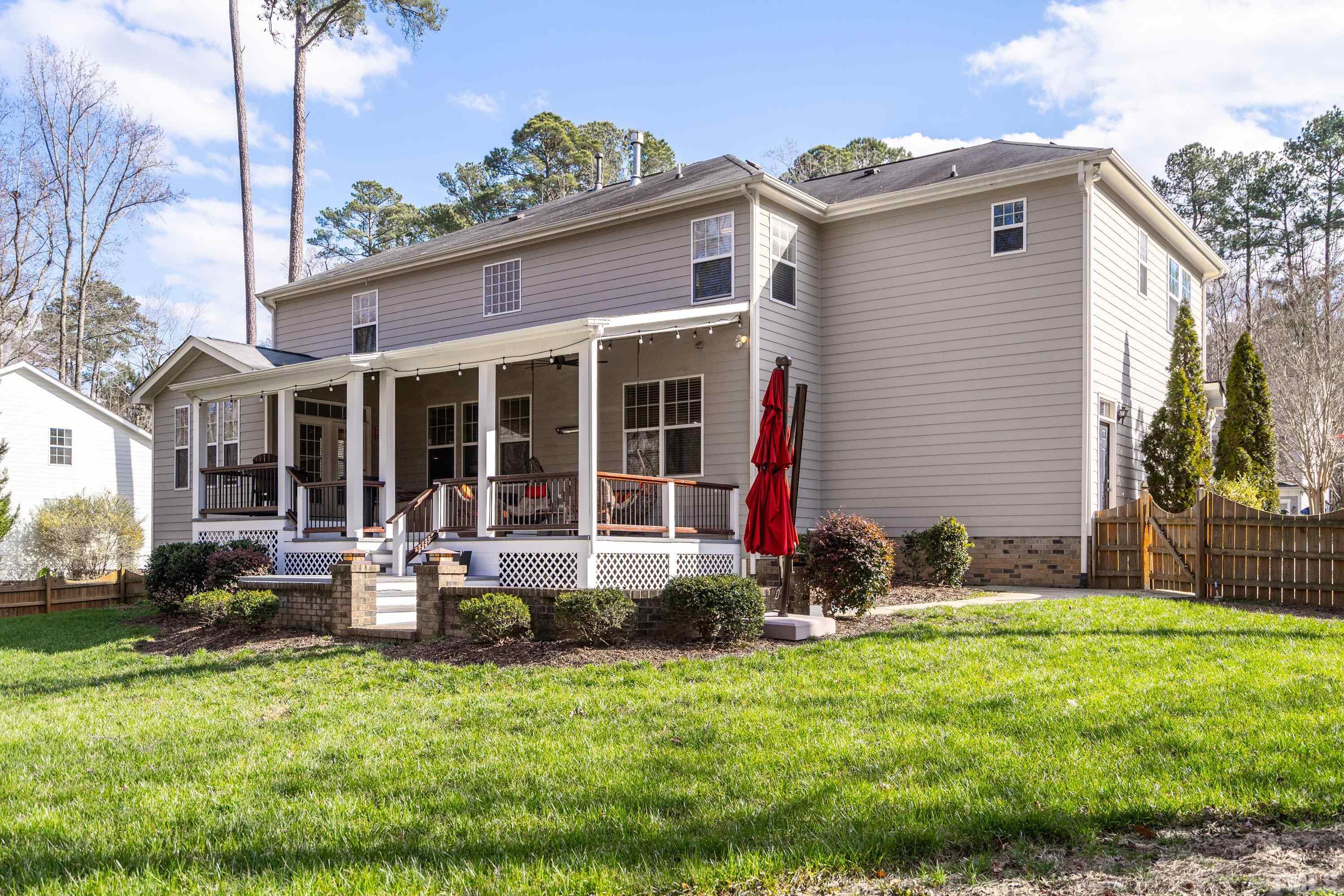 13016 Saxon Way Raleigh, NC 27613 - Photo 25 of 49 a house view with a garden space
