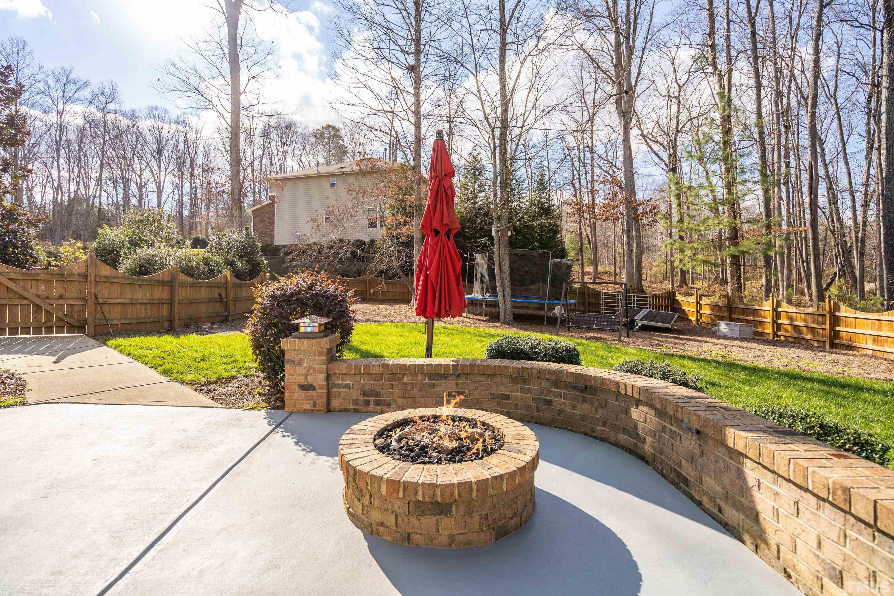 13016 Saxon Way Raleigh, NC 27613 - Photo 30 of 49 a view of outdoor space yard and swimming pool