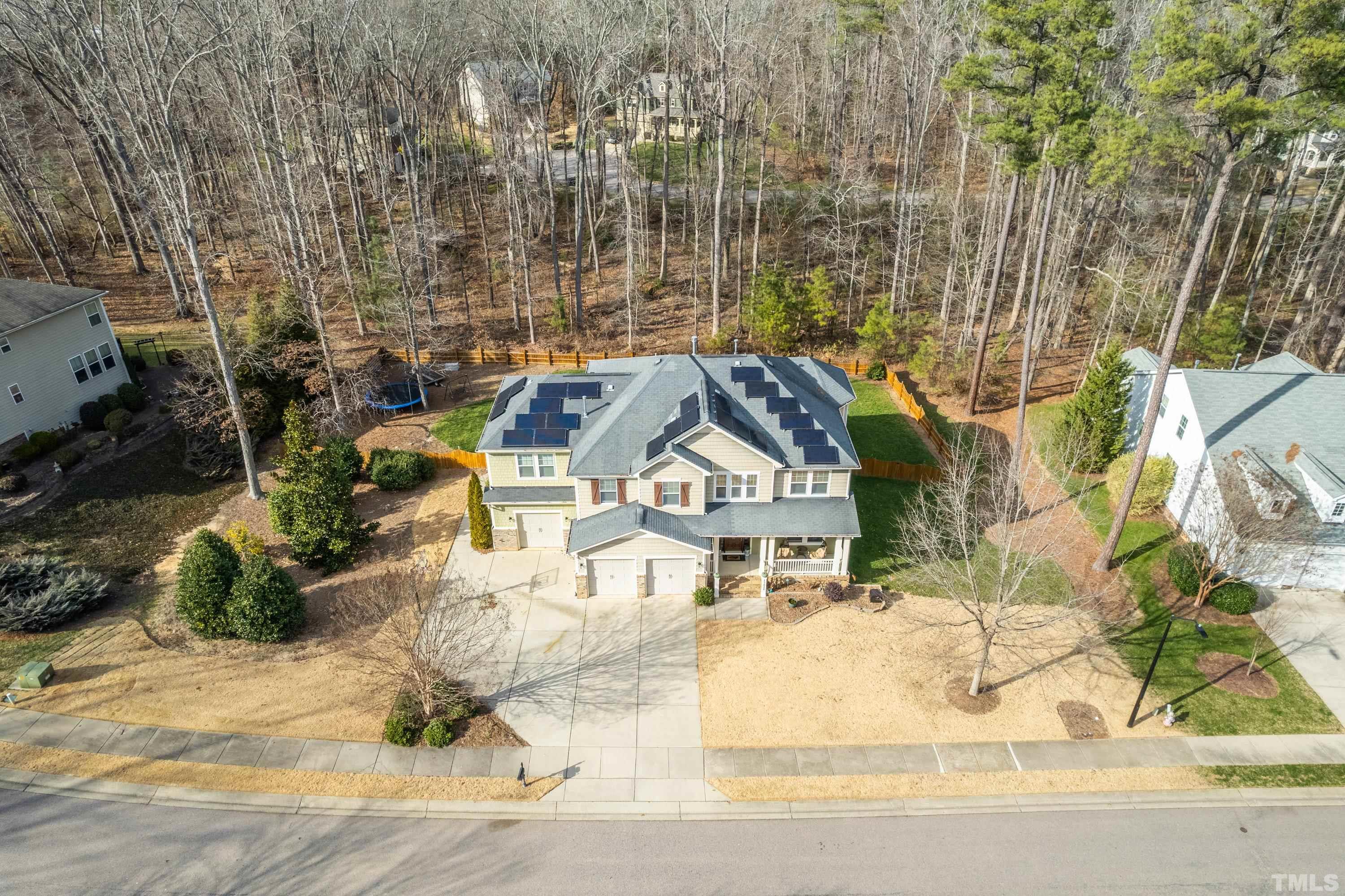 13016 Saxon Way Raleigh, NC 27613 - Photo 5 of 49 an aerial view of a house with a yard and sitting area