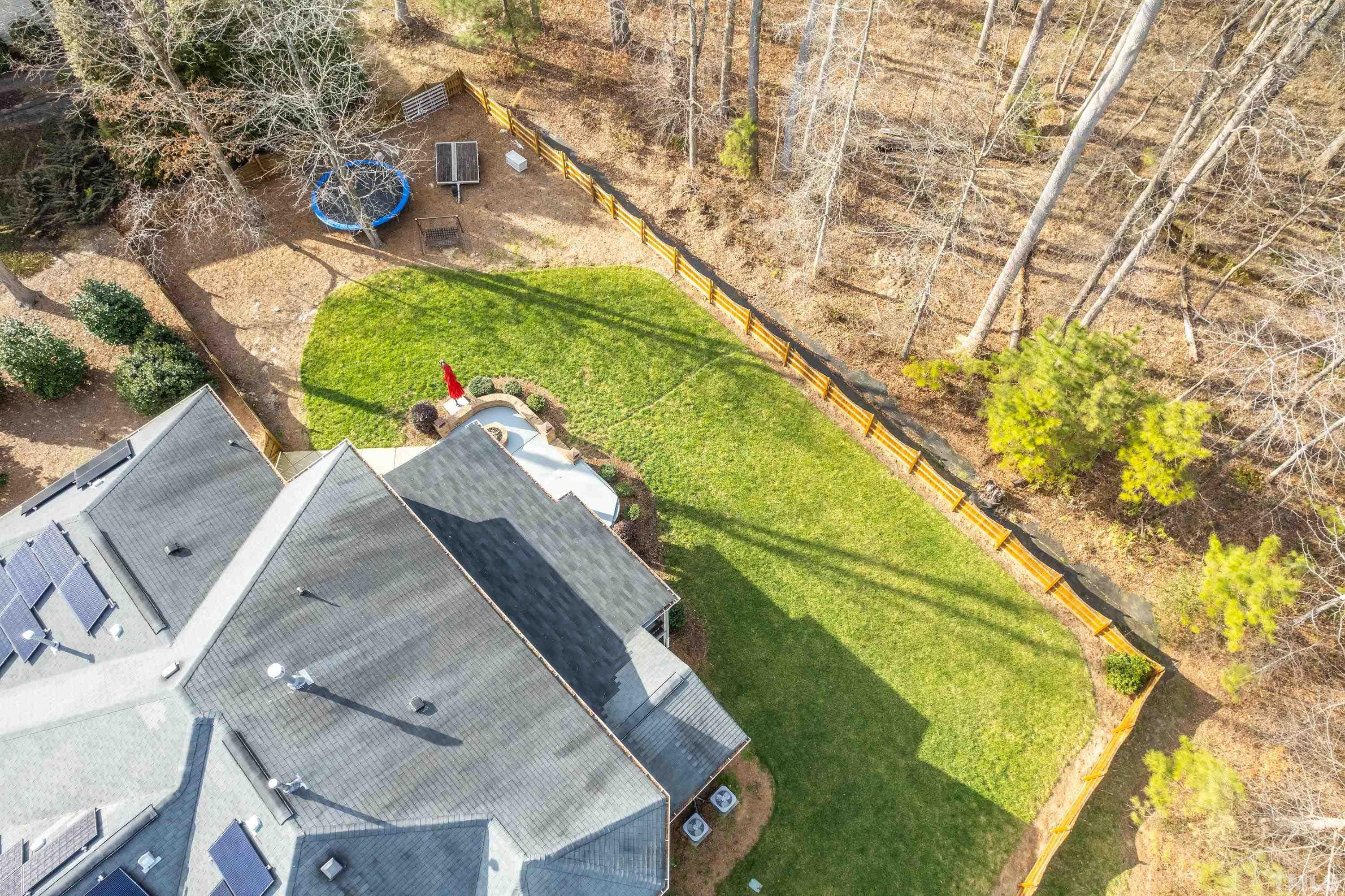 13016 Saxon Way Raleigh, NC 27613 - Photo 8 of 49 a view of yard from a balcony