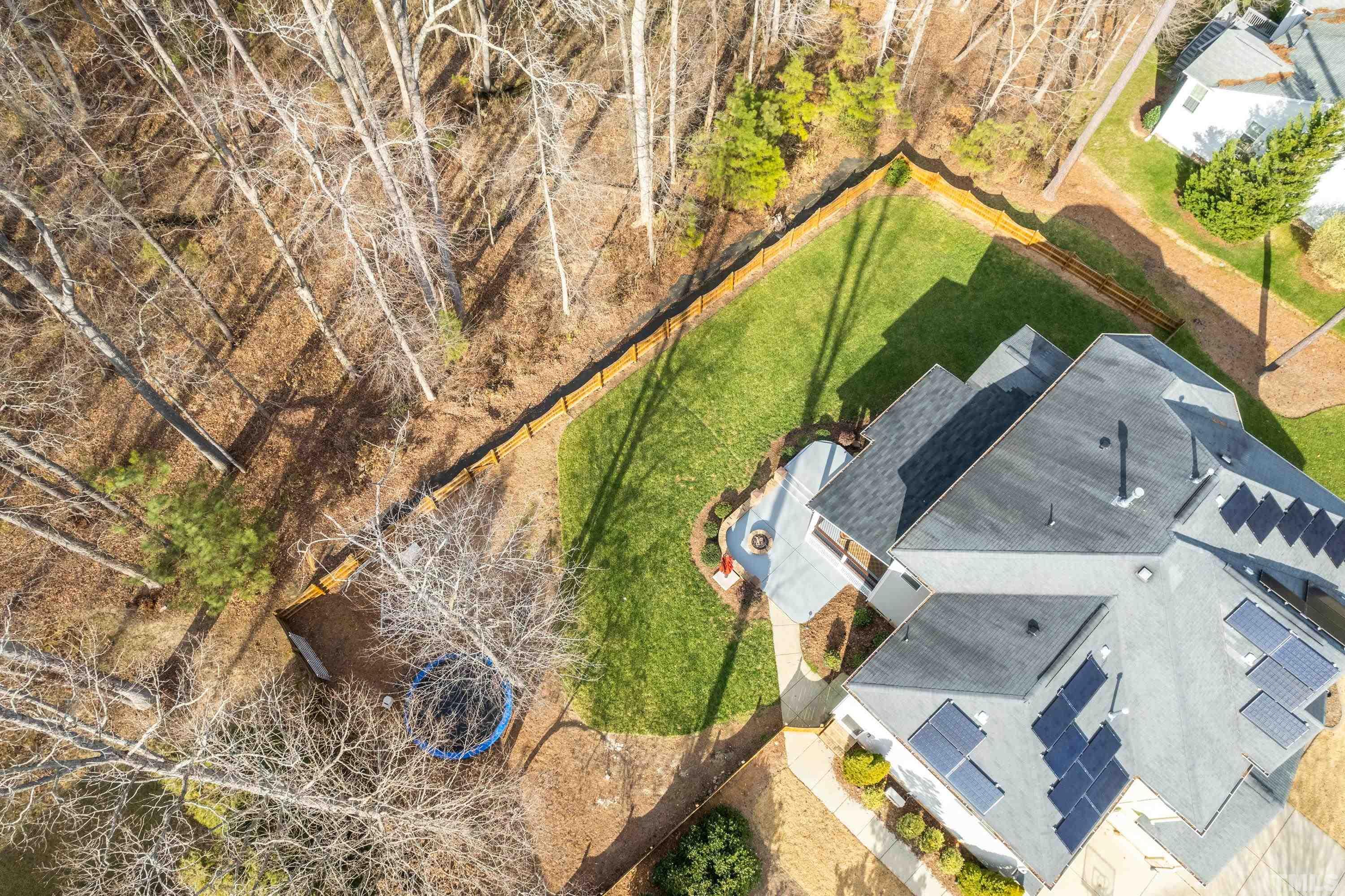 13016 Saxon Way Raleigh, NC 27613 - Photo 9 of 49 an aerial view of a house with a yard and potted plants