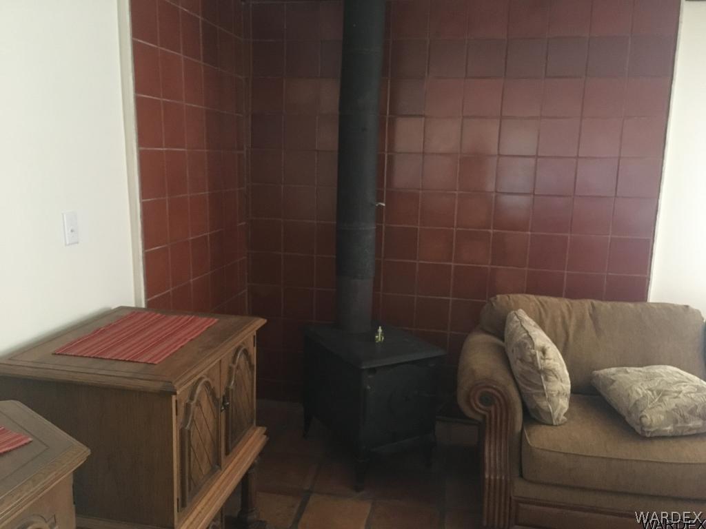3968 Bacobi Road Golden Valley, AZ 86413 - Photo 13 of 15 Fireplace in Great Room