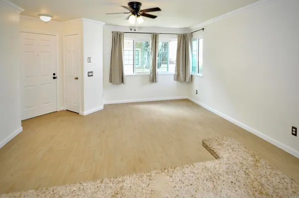 a view of an empty room and window