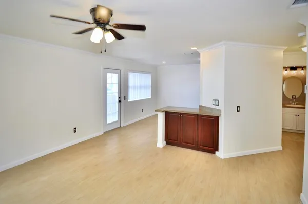 a view of an empty room and window