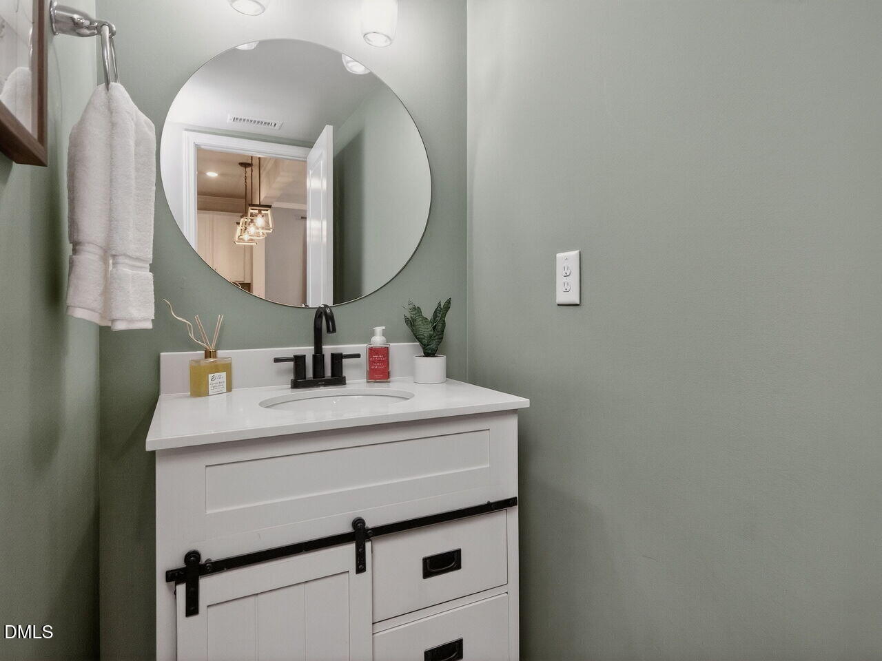 111 Velten Ridge Drive Durham, NC 27713 - Photo 13 of 32 a bathroom with a sink vanity and a mirror