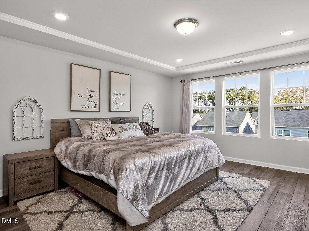 111 Velten Ridge Drive Durham, NC 27713 - Photo 15 of 32 a bedroom with a large bed and a window
