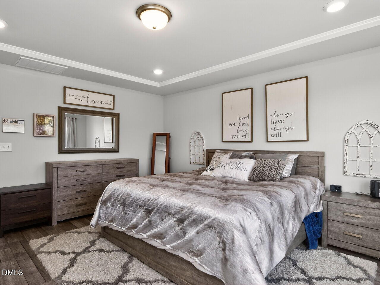 111 Velten Ridge Drive Durham, NC 27713 - Photo 16 of 32 a bedroom with a bed and a lamp on dresser