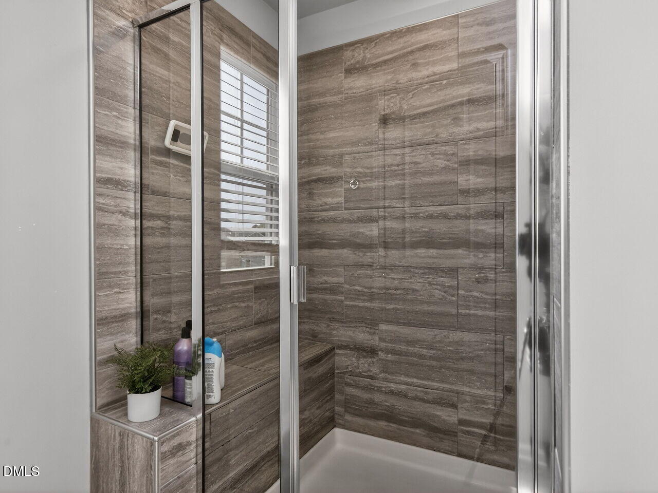 111 Velten Ridge Drive Durham, NC 27713 - Photo 19 of 32 a bathroom with a shower