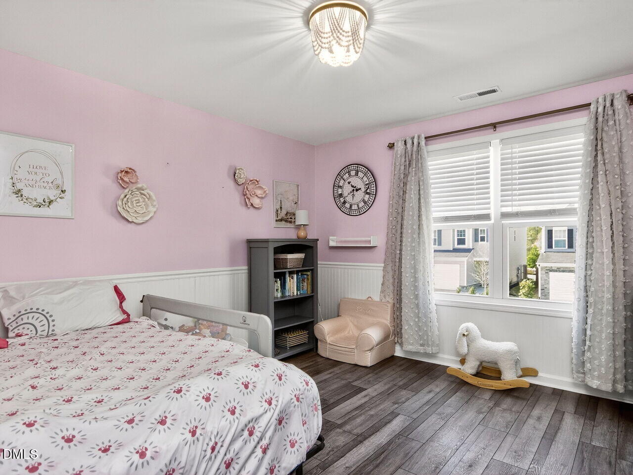 111 Velten Ridge Drive Durham, NC 27713 - Photo 22 of 32 a bedroom with a bed and wooden floor