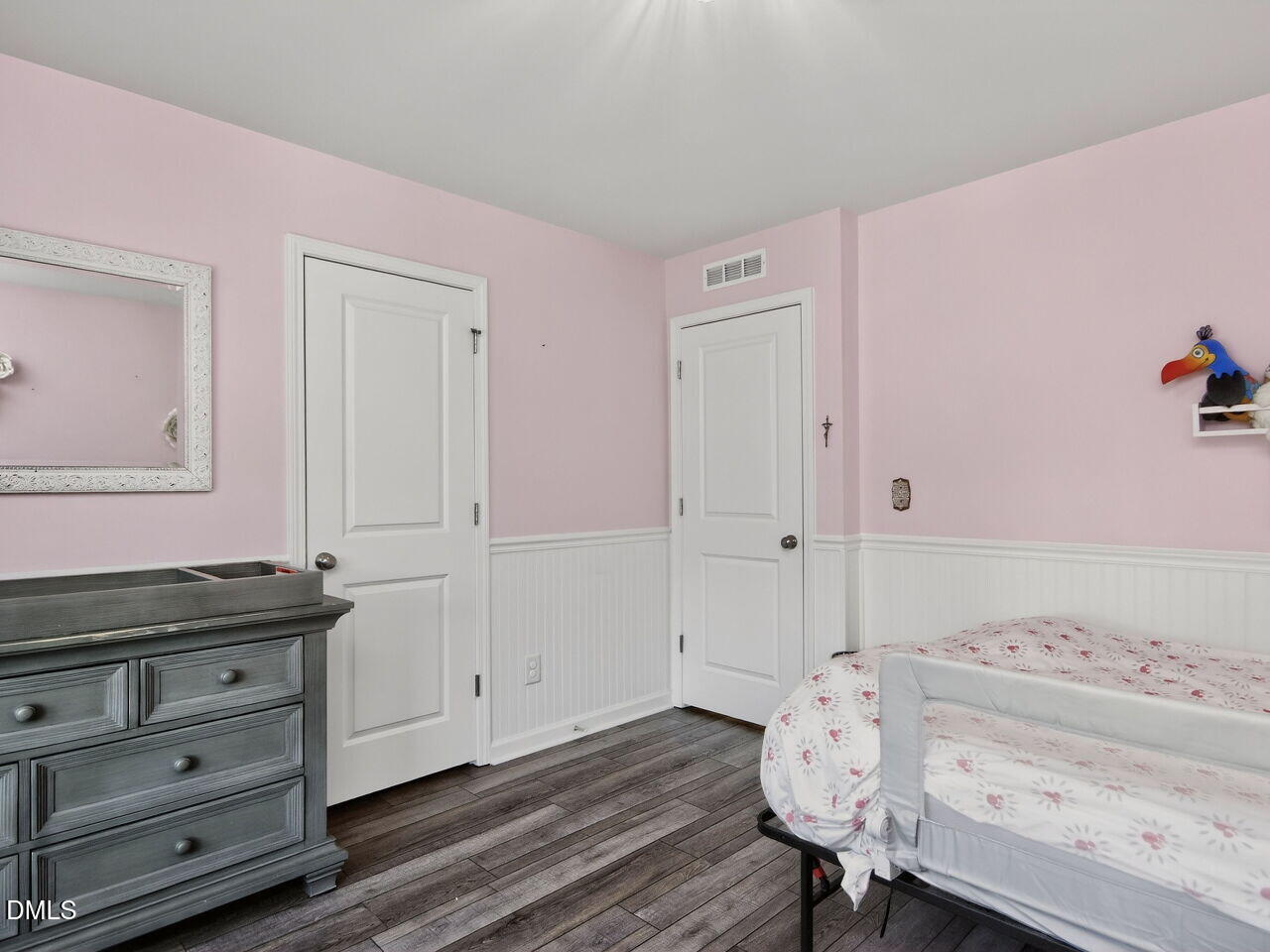 111 Velten Ridge Drive Durham, NC 27713 - Photo 23 of 32 a bedroom with a bed and a dresser