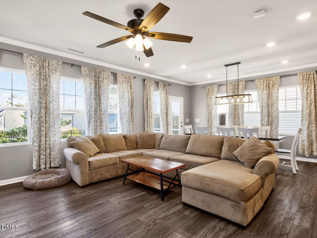 111 Velten Ridge Drive Durham, NC 27713 - Photo 7 of 32 a living room with furniture ceiling fan and a window